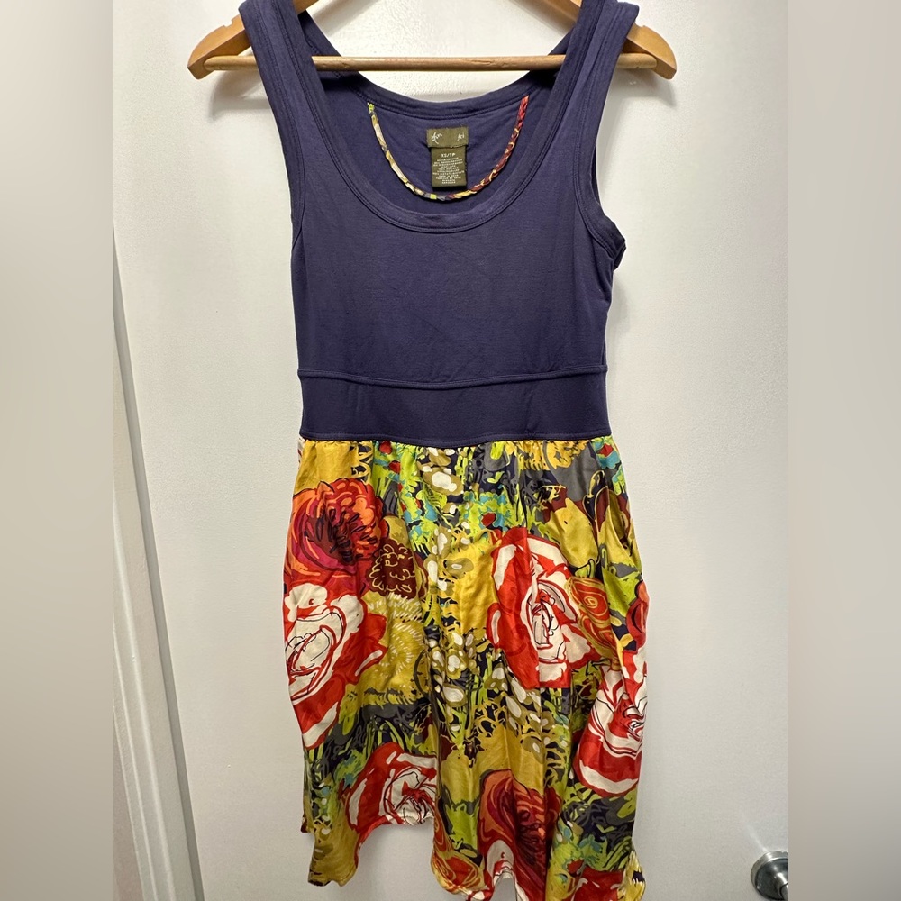 Anthropologie dress with floral skirt , stretch fabric and pockets